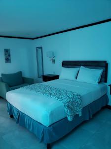 Sand and Blue Seas客房内的一张或多张床位