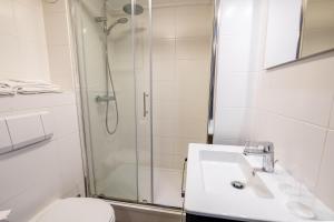 Koupelna v ubytování Hotel Almenum - het sfeervolle stadslogement -