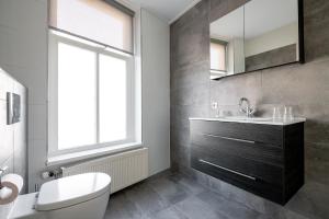 Koupelna v ubytování Hotel Almenum - het sfeervolle stadslogement -