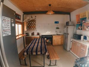 Una cocina o zona de cocina en Rey Lagarto Hostel