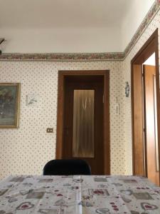 Postel nebo postele na pokoji v ubytování Ai Leoni