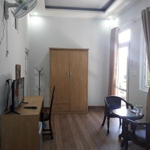 TV a/nebo společenská místnost v ubytování Dang Nguyen Guesthouse