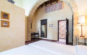 Posteľ alebo postele v izbe v ubytovaní La Casona de Calderón Gastronomic & Boutique Hotel