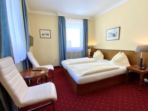En eller flere senger på et rom på Hotel Turnerwirt