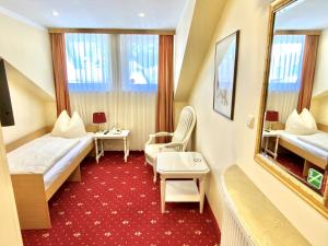 En eller flere senger på et rom på Hotel Turnerwirt