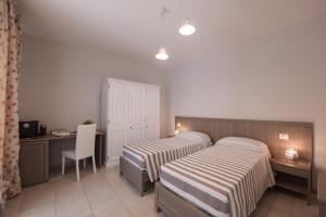 Łóżko lub łóżka w pokoju w obiekcie Terra Mater - Exclusive Cottage -