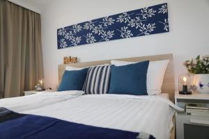 Postel nebo postele na pokoji v ubytování Hotel Weinlaube