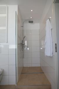 Koupelna v ubytování Hotel Weinlaube