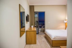 Postel nebo postele na pokoji v ubytování Hotel Jaroal