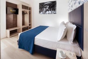 Cama o camas de una habitación en Residence Queen