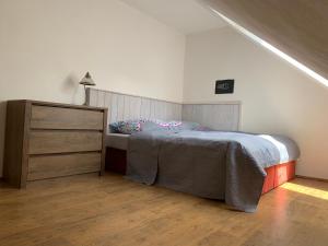 Postel nebo postele na pokoji v ubytování Apartmán Stodola