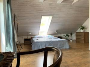 Postel nebo postele na pokoji v ubytování Apartmán Stodola