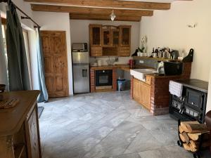 Kuchyň nebo kuchyňský kout v ubytování Apartmán Stodola