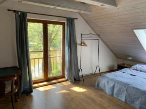 Postel nebo postele na pokoji v ubytování Apartmán Stodola