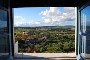 a view of a town from a window at Casa De Terena in Terena