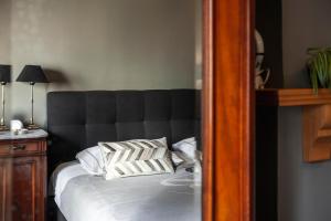 Postel nebo postele na pokoji v ubytování B&B La Passion Interdite