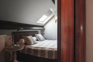 Postel nebo postele na pokoji v ubytování B&B La Passion Interdite