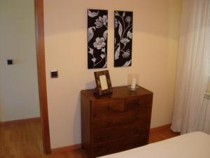 Posteľ alebo postele v izbe v ubytovaní Apartamentos Sarela