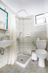 Koupelna v ubytování Louiza Hotel