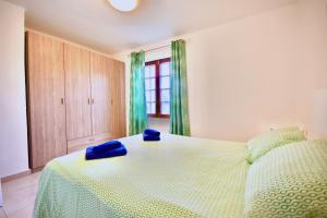 Кровать или кровати в номере Aloe +8 фотографий