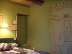 A bed or beds in a room at Pazo de Verdes