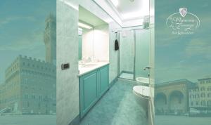a bathroom with a sink and a toilet and a city at B&B La Signoria Di Firenze in Florence +17 photos