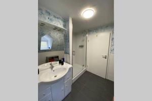 Koupelna v ubytování Ferienwohnung „Forsthaus Bigge“ + 22 fotografií