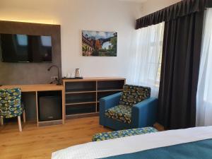 Televisyen dan/atau pusat hiburan di Hotel KORTUS