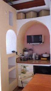 A kitchen or kitchenette at Greek Cottage Playas de Tijuana