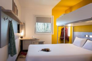 Postel nebo postele na pokoji v ubytování ibis budget Amsterdam Airport