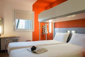 Postel nebo postele na pokoji v ubytování ibis budget Amsterdam Airport