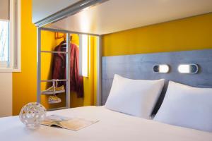 Postel nebo postele na pokoji v ubytování ibis budget Amsterdam Airport