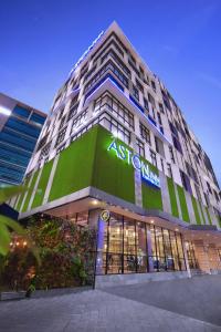 a building with a sign on the front of it at ASTON Inn Pandanaran in Semarang