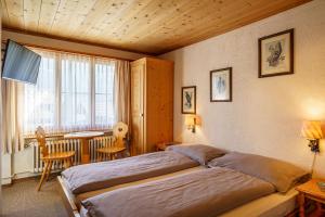 Katil atau katil-katil dalam bilik di Hotel Silvapina