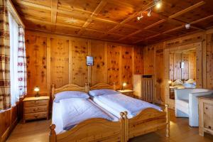 Postel nebo postele na pokoji v ubytování Hotel Silvapina