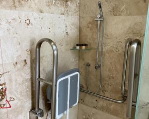 a shower stall in a bathroom with a toilet at The Carpenters Arms in Thirsk +30 photos