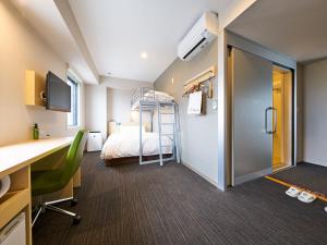 Postel nebo postele na pokoji v ubytování Super Hotel Kashima