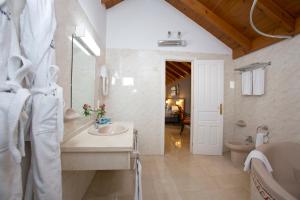 a bathroom with a sink and a toilet at Ona Alanda Club Marbella in Marbella