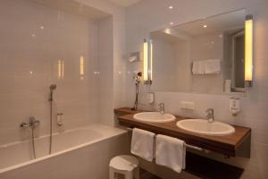 Koupelna v ubytování Posthotel Kolberbräu