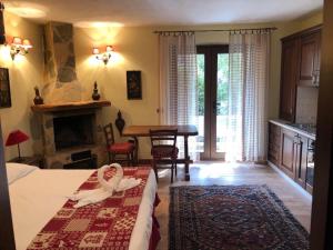 Postel nebo postele na pokoji v ubytování Garnì Astoria Hotel & SPA