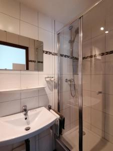Ванна кімната в Hotel Garni Steiermark