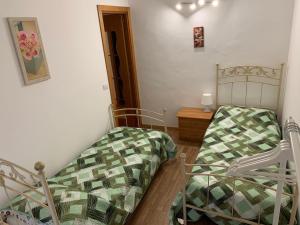 Giường trong phòng chung tại Casa Dolce Casa