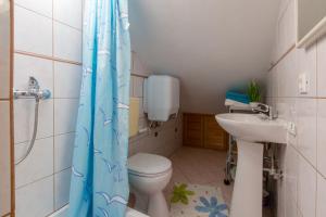 Kúpeľňa v ubytovaní Apartmani Tena