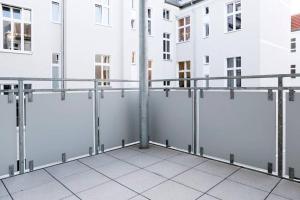 a view of a balcony in a building at SC 6 Cozy Family & Business Flair welcomes you - Rockchair Apartments in Berlin