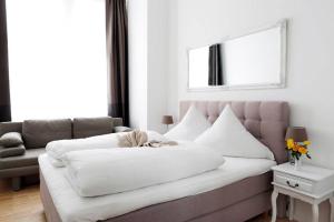 Кровать или кровати в номере SC 6 Cozy Family & Business Flair welcomes you - Rockchair Apartments
