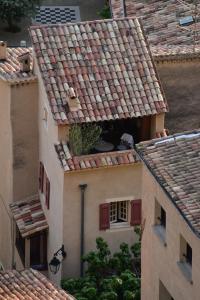 an overhead view of a building with a roof at La Maison de Moustiers in Moustiers-Sainte-Marie