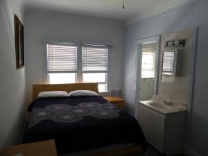Postel nebo postele na pokoji v ubytování Hotel del Flores