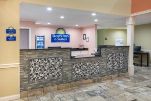The lobby or reception area at Days Inn & Suites by Wyndham Florence/Jackson Area