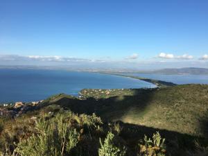 an island in the middle of a body of water at Bike&Boat Argentario Hotel in Porto Santo Stefano
