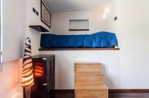 A bed or beds in a room at Casa Costanza
